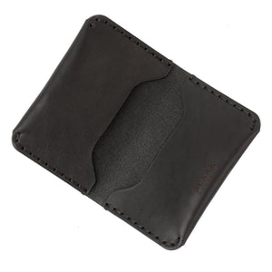 open interior of black leather three card pocket folded wallet
