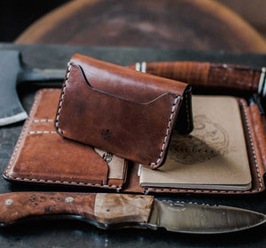 folded view of three card brown leather wallet