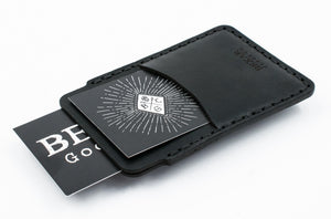 black leather card sleeve with outer sleeve wallet with cards exiting pockets