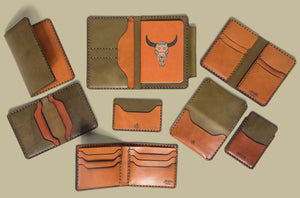 arraay of brown and green leather wallet in varying sizes