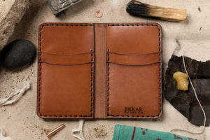 Interior view of brown leather four pocket vertical wallet