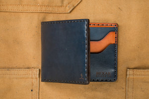 folded exterior view of blue and brown leather four card pocket bifold wallet