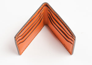 top view of interior of Orange six pocket bifold wallet