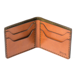 interior view of green exterior and brown interior leather four pocket bifold wallet