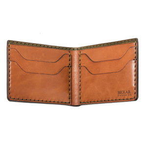 open interior view of green exterior and brown interior leather four pocket bifold wallet