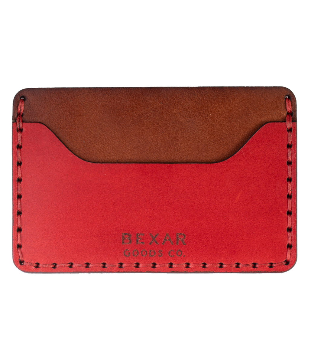 two pocket leather wallet with center divider shown in red and brown leather 