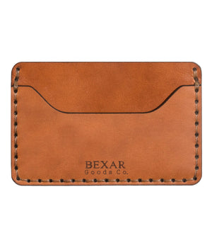 Whiskey cordovan and brown leather two pocket slim wallet showing engraved Bexar logo