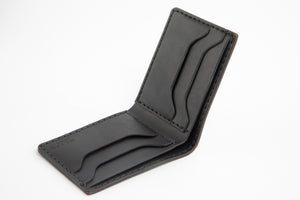 open top profile of black leather four card pocket bifold wallet showing cash stash