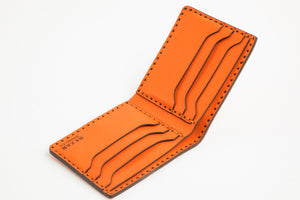 top interior view of Orange six pocket bifold wallet