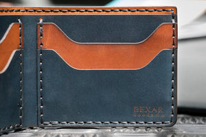 Interior view of blue and brown leather four card pocket bifold wallet