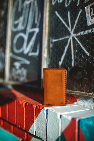 exterior view of brown leather vertical wallet