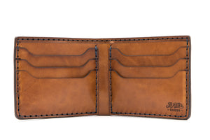 interior of blue cordovan and brown leather six pocket bifold wallet