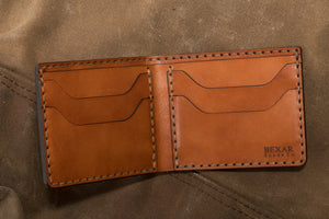 interior view of whiskey cordovan leather with brown interior four pocket bifold wallet