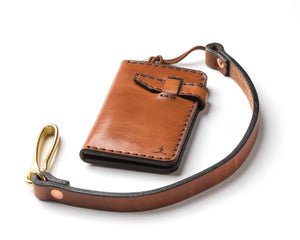 four pocket long brown leather wallet with brass keychain lanyard