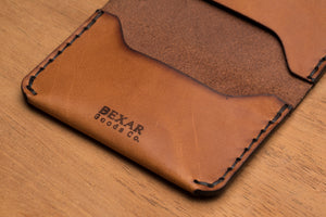 interior view of three card brown leather wallet with laser engraved Bexar logo