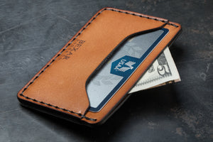 brown leather wallet showcasing card sleeve with center divider for cash bills