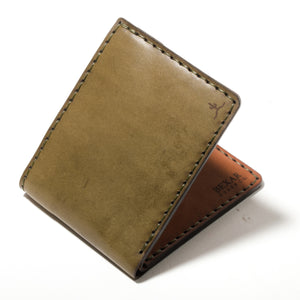 folded exterior view of green exterior and brown interior leather four pocket bifold wallet