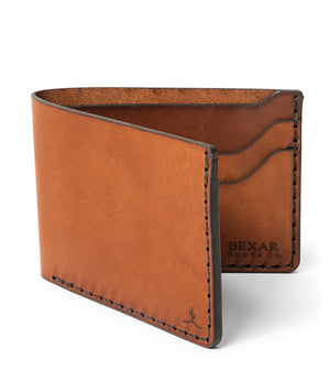 brown leather bifold with 4 card pockets and one cash sleeve