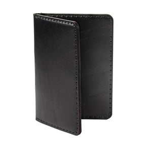 folded view of black leather passport wallet with two card pockets