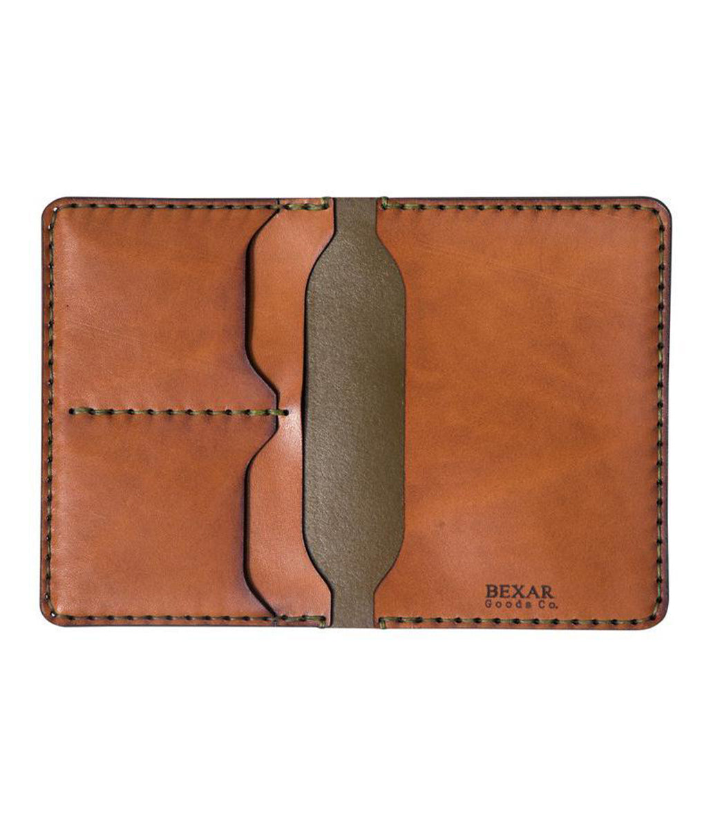 green outer and brown inner leather passport wallet with two card pockets