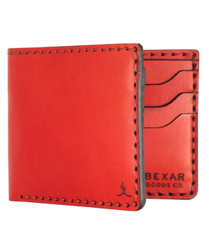 red leather bifold wallet with six pockets and one cash sleeve