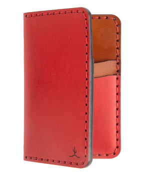 red exterior and brown interior leather wallet with four card pockets